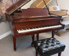 Steinway Model M baby grand piano and artist bench